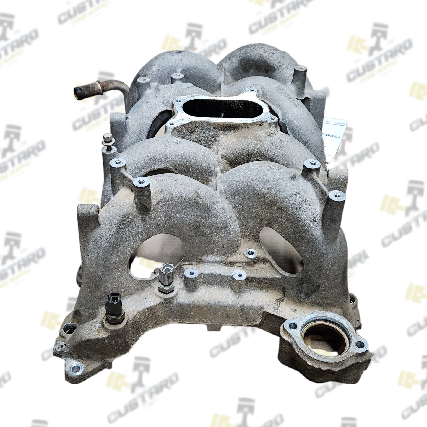 Ford F65E9424BE Intake Part for Ford vehicles.