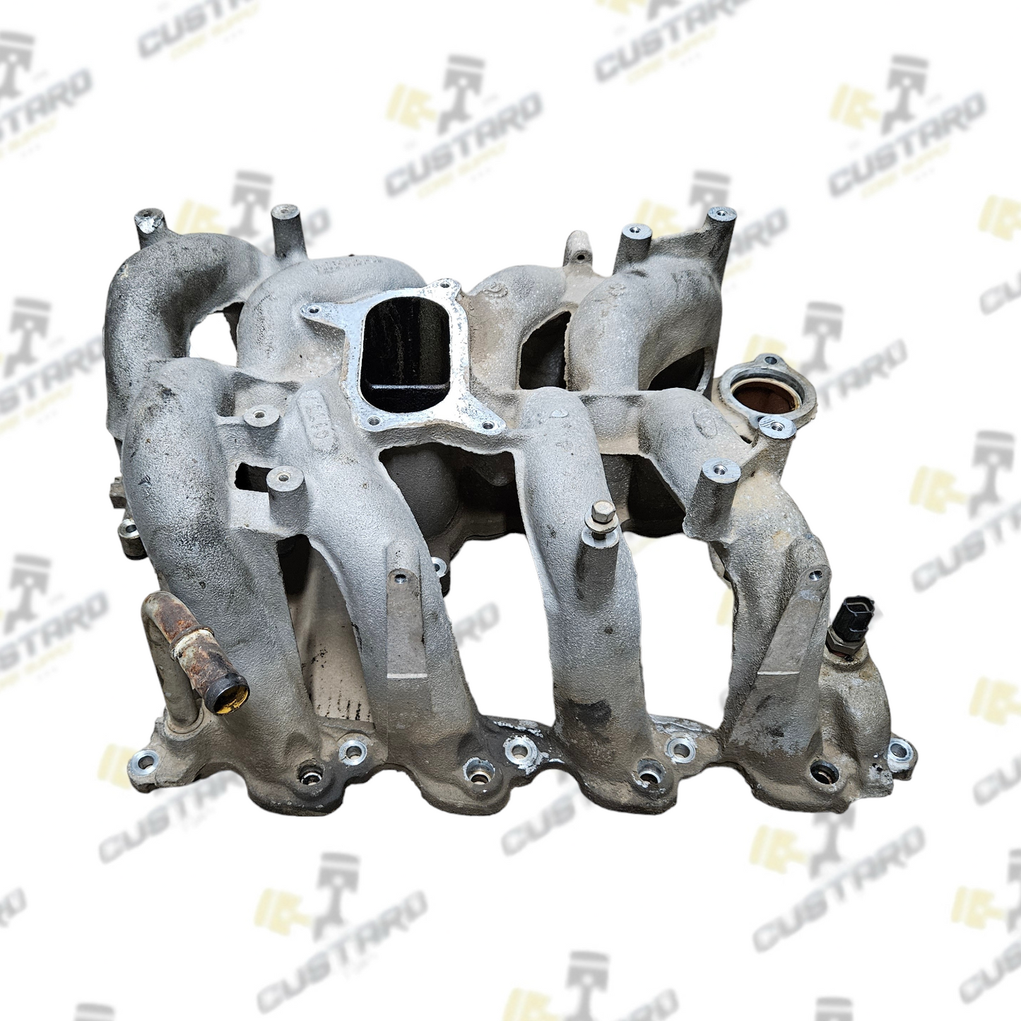 Ford F65E9424BE Intake Part for Ford vehicles.